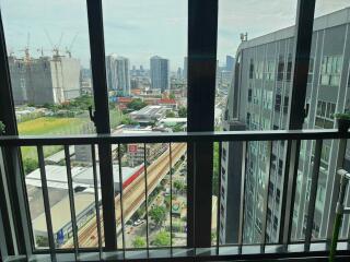 View from a balcony overlooking a cityscape