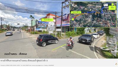 Street view of neighborhood showing a busy intersection with traffic and nearby businesses.