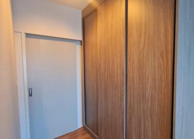 Hallway with wooden floor and built-in wardrobe