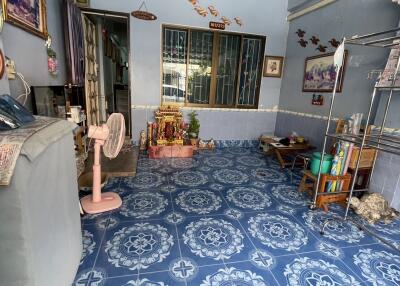 Living room with blue patterned floor tiles