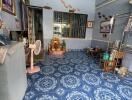 Living room with blue patterned floor tiles