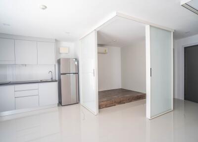 Modern kitchen with adjacent sliding glass door room