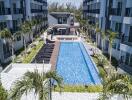 Outdoor pool area with surrounding buildings