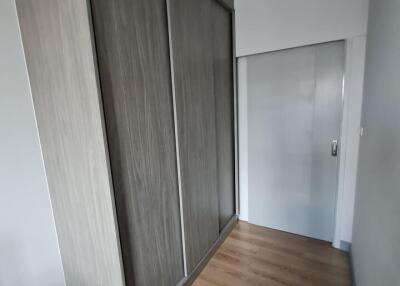 Hallway with wooden floor and sliding wardrobe