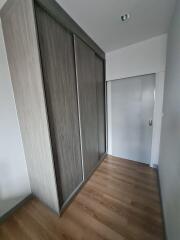 Hallway with wooden floor and sliding wardrobe