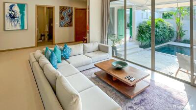 Bright living room with pool view