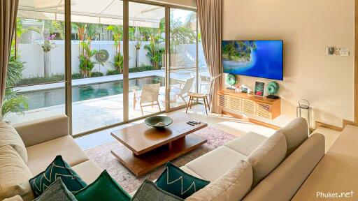 Living room with view of the pool