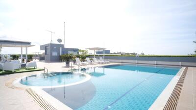 Swimming pool with lounge chairs and sun deck