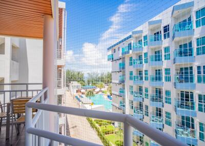 Balcony view of modern residential buildings with blue windows