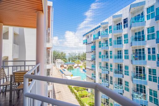 Balcony view of modern residential buildings with blue windows