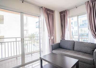 Modern living room with balcony access