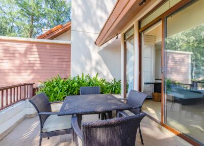 Spacious outdoor patio with seating area