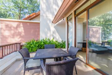 Spacious outdoor patio with seating area