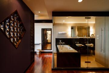 Modern bathroom with glass shower and bathtub