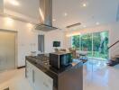 Modern kitchen and dining area with island and appliances