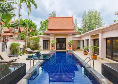 luxurious outdoor area with a pool