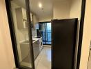 Modern laundry room with washing machine and shelving