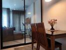 Modern dining area with glass partition