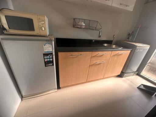 Compact kitchen with essential appliances