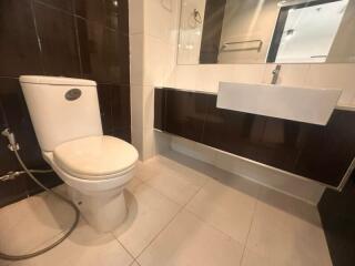 Modern bathroom with toilet and vanity