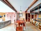 Spacious dining area with wooden table and chairs