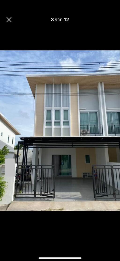 Front view of a two-story building with a modern facade