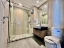 Modern bathroom with glass-enclosed shower and vanity