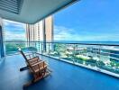 Spacious balcony with seating and ocean view