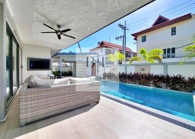 Outdoor seating area with pool