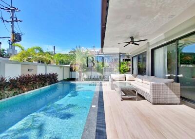 Outdoor seating area with swimming pool