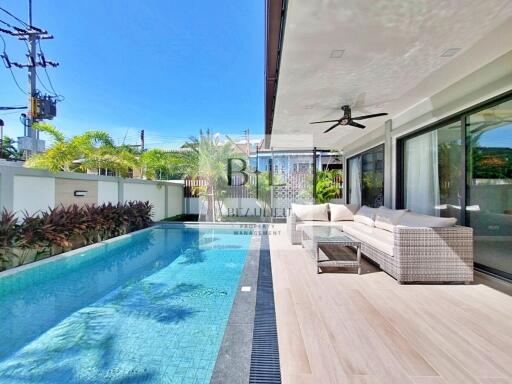 Outdoor seating area with swimming pool