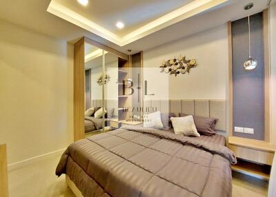 Modern bedroom with double bed and decorative elements