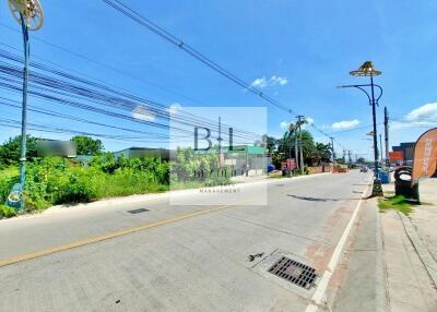 Street view in a residential area with clear sky