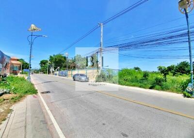 Quiet suburban street with clear skies