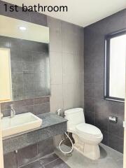 Modern bathroom with sink and toilet