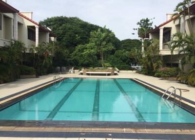 Bright swimming pool area in a residential complex