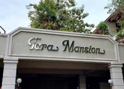 Entrance of Tara Mansion with signage