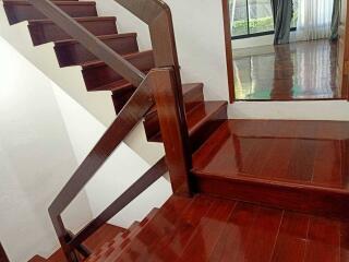 Wooden staircase with polished steps
