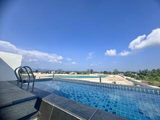 rooftop swimming pool with scenic view