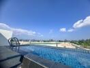 rooftop swimming pool with scenic view