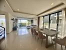 Spacious and bright living room with dining area