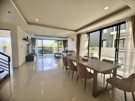 Spacious and bright living room with dining area