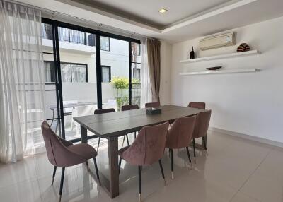 Modern dining area with large windows