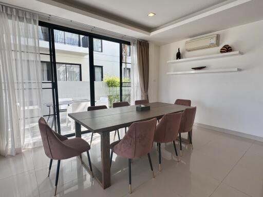 Modern dining area with large windows