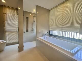 Modern bathroom with bathtub and shower