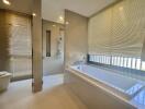 Modern bathroom with bathtub and shower