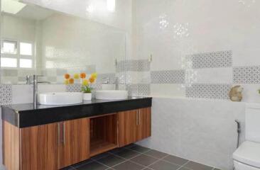 Modern bathroom with double sink and stylish decor