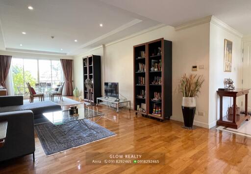 Spacious living room with modern furniture and a large window