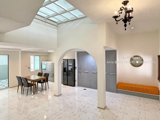 Modern kitchen and dining area with skylight