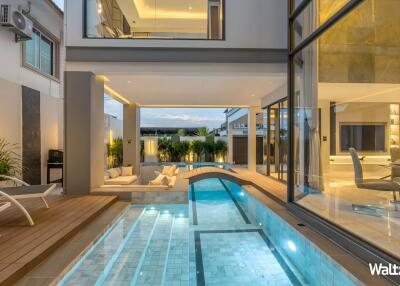 Modern house with indoor-outdoor pool area